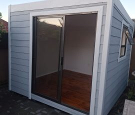 Modern Nutec garden room with aluminium sliding door by Mutsamvi Construction.