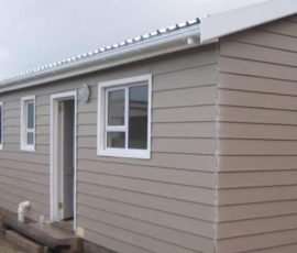 Custom-built Nutec home with durable cladding and modern windows by Mutsamvi Construction.